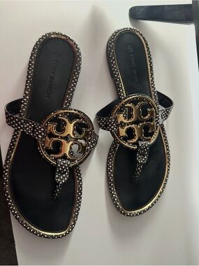 Tory Burch Black Sandal with Gold Logo Medallion and Studded Trim